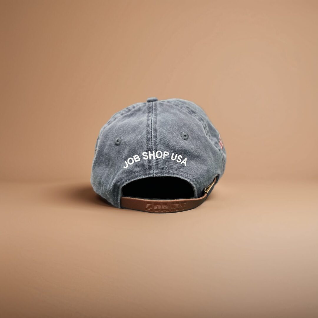A cap that is sitting on the ground.
