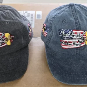 Two hats with a bee and american flag on them.